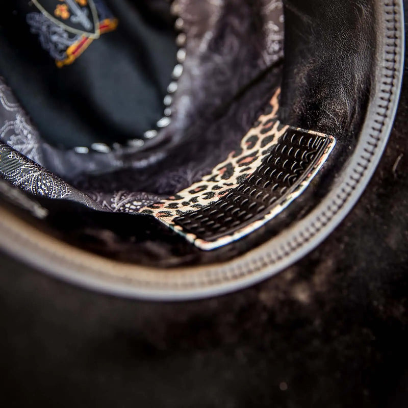 Leopard Hat Cinch installed in a black felt cowboy hat