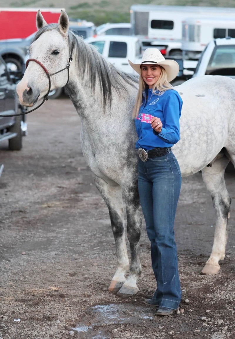 Cowgirl Barbie Bandit Hat Cinch Pro Series Collection held by Breakaway Roper Haley Wright