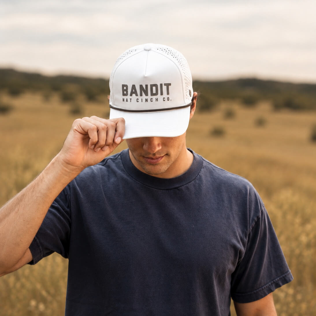 Man Wearing Maverick Cap in White