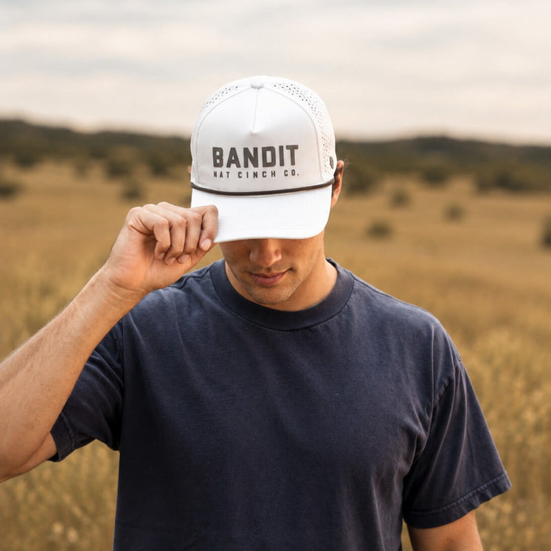 Man Wearing Maverick Cap in White