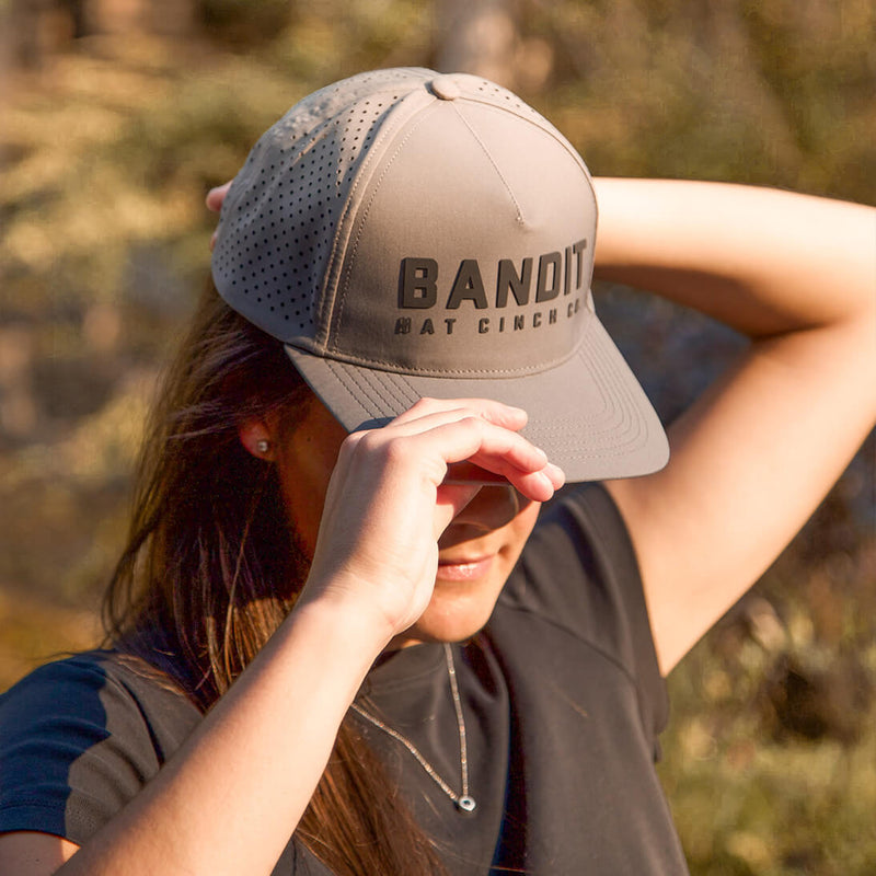Woman Wearing Maverick Cap in Charcoal